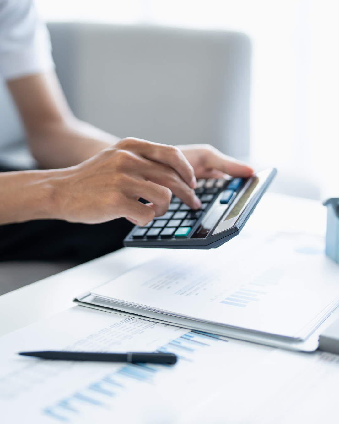 Business owner reviewing tax deadline paperwork